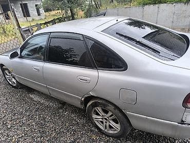 Продажа авто: Серебристый хэтчбек 5‑дверный. Просторный салон, тонированные стекла — 3
