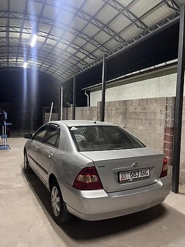 Toyota Corolla: 2003 г., 1.4 л, Механика, Бензин, Седан