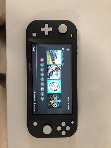 Nintendo Switch Lite (серый) — портативная игровая консоль Новый — 1