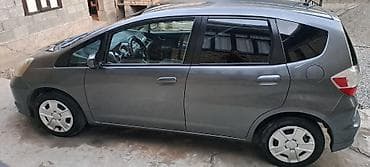 byd e3: Honda Fit: 2012 г., 1.5 л, Автомат, Бензин, Хэтчбэк — 2