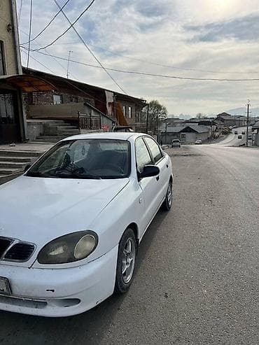 subaru forester sf5: Daewoo Lanos: 1997 г., Бензин, Седан — 4