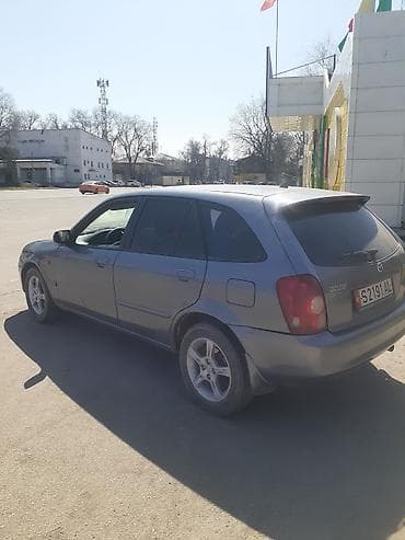 mazda 929: Mazda 323: 2003 г., 1.6 л, Механика, Бензин, Универсал — 2