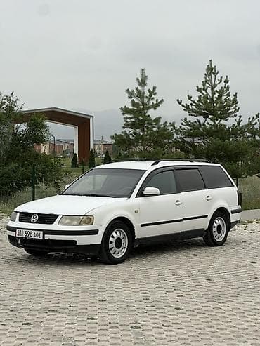 мата секыл: Volkswagen Passat: 1998 г., 1.6 л, Кол менен иштөөчү, Газ, Универсал — 2