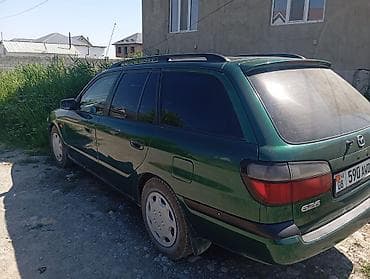 макси скутера: Mazda 626: 1999 г., 1.8 л, Механика, Бензин, Универсал — 4