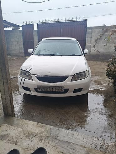 sf moto: Mazda Familia: 2001 г., 1.3 л, Автомат, Бензин, Седан — 10