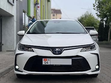 карола гибрид: Toyota Corolla: 2022 г., 1.8 л, Автомат, Гибрид, Седан — 1