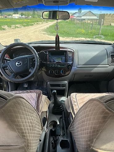 Mazda Tribute: 2002 г., 2 л, Кол менен иштөөчү, Кроссовер — 10