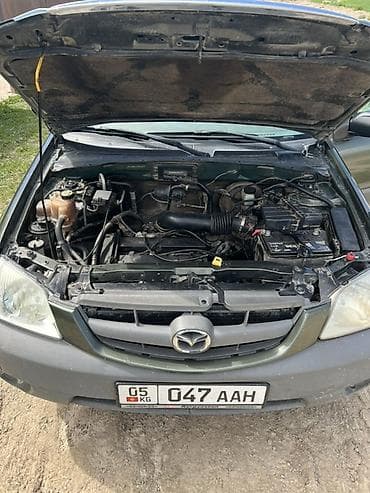 Mazda Tribute: 2002 г., 2 л, Механика, Бензин, Кроссовер — 6