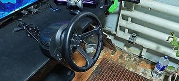 trak racer: Комплект для симрейсинга Thrustmaster + аксессуары Состав: - Руль — 7