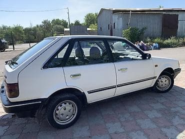 Продажа авто: Mazda 323: 1987 г., 1.5 л, Механика, Бензин, Хэтчбэк — 3
