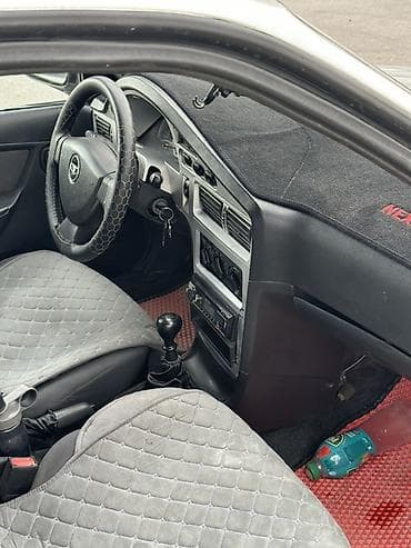 bcd com: Daewoo Nexia: 2008 г., Механика, Бензин, Седан — 4