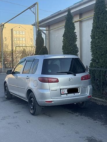 лейсан машина: Mazda Demio: 2003 г., 1.3 л, Автомат, Бензин, Хэтчбэк — 4