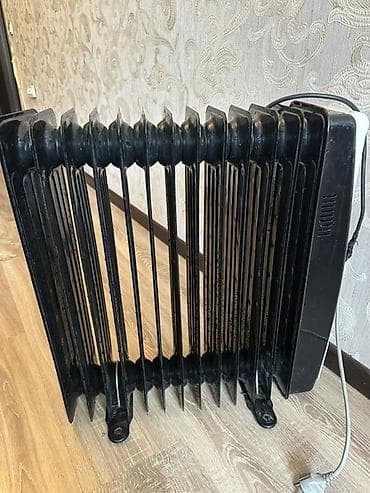 конвектор: Масляный обогреватель Кол-во секций: 10 и более, Несколько режимов мощности — 2