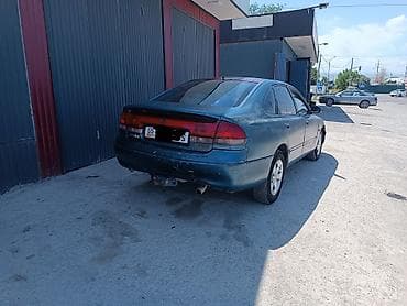 mazda 123: Mazda 626: 1995 г., 1.8 л, Механика, Бензин, Седан — 2