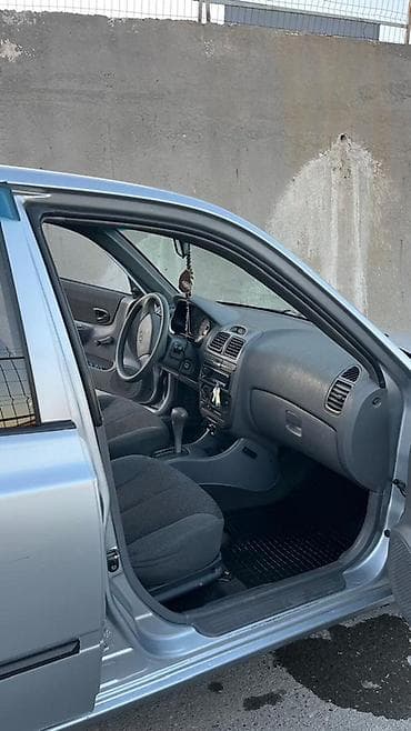 mazda 323: Hyundai Accent: 2007 г., 1.5 л, Автомат, Бензин, Седан — 9