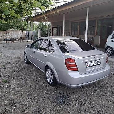 e 55 amg: Седан класса C, серебристый цвет кузова. Компактные размеры и удобная — 4
