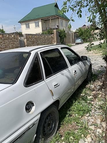 byd leopard: Daewoo Nexia: 1995 г., Механика, Седан — 5