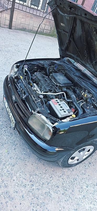 Продажа авто: Nissan March: 1996 г., 1 л, Механика, Бензин, Хэтчбэк — 9