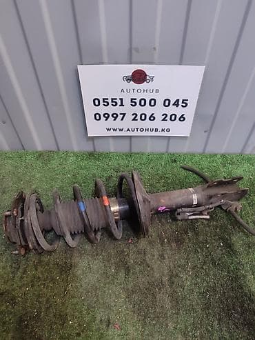step rf3: Амортизатор (стойка в сборе) передний левый для Toyota Raum EXZ10 — 1