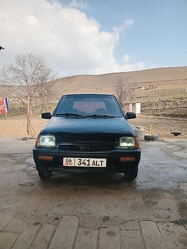 Компактный городской хэтчбек 5 дверей. Кузов: - Цвет: тёмно‑зелёный -