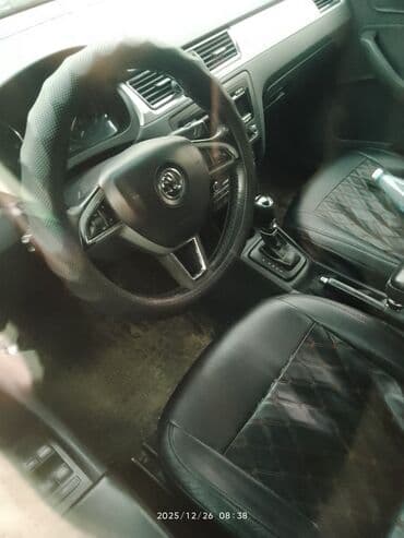 Продажа авто: Skoda Rapid: 2015 г., 1.4 л, Автомат, Бензин, Седан — 5