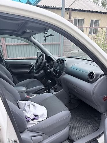 перья: Toyota RAV4: 2002 г., 2 л, Автомат, Бензин, Кроссовер — 9