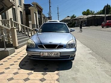 пару: Продаю Daewoo Nubira (Нубира) седан, 2003 год, цвет небесный металлик — 4