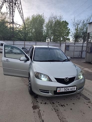 арзан машине: Mazda Demio: 2003 г., 1.3 л, Автомат, Бензин, Хетчбек — 2