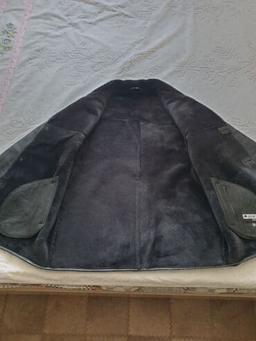 Атайын кийим: Мужская дублёнка Вид застёдки: на пуговицах. Материал: овчина. Цвет — 2