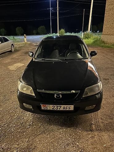 салон жасайбыз: Mazda 323: 2001 г., 1.6 л, Кол менен иштөөчү, Хетчбек — 6