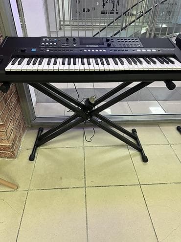 Синтезатор/аранжировщик Yamaha 483 Основные характеристики: - 61
