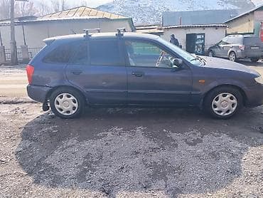 audi c5: Mazda 323: 2003 г., 1.3 л, Механика, Бензин, Хэтчбэк — 3