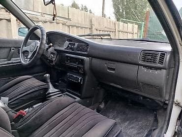 Унаа: Mazda Capella: 1990 г., 2 л, Кол менен иштөөчү, Бензин, Седан — 5