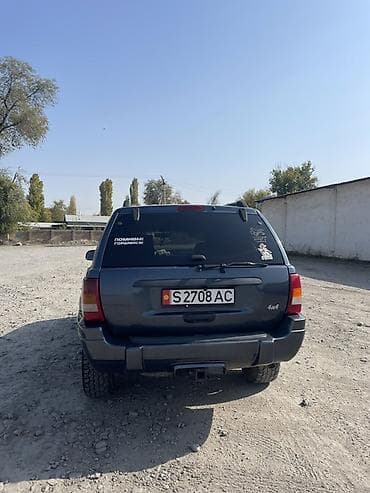 diska 14: Jeep Grand Cherokee: 2002 г., 4 л, Автомат, Газ, Внедорожник — 5