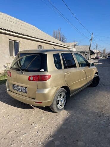дом на обмен: Mazda Demio: 2003 г., 1.3 л, Автомат, Бензиновая, Хэтчбэк — 2