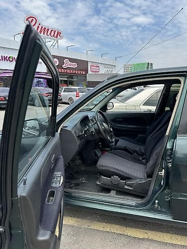 Продажа авто: Daihatsu Sirion: 2003 г., 1 л, Механика, Бензин, Хэтчбэк — 3
