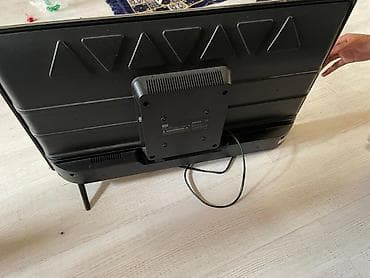 40: Телевизор TCL, диагональ около 32–40". Особенности и подключение: - — 2