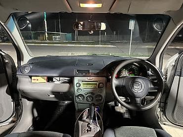 радио для авто: Mazda Demio: 2003 г., 1.5 л, Типтроник, Бензин, Хэтчбэк — 7