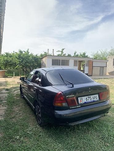 кулиса спейс стар: Mitsubishi Carisma: 1996 г., 1.8 л, Механика, Бензин, Седан — 3