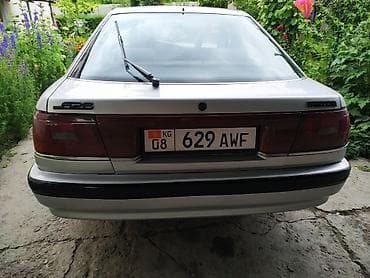 авто сатылат: Mazda 626: 1988 г., 2 л, Кол менен иштөөчү, Бензин, Хетчбек — 6