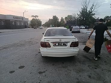 морнинг диска: Nissan Sunny: 2003 г., 1.8 л, Автомат, Бензин, Седан — 4