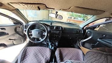 mini coper: Mazda 323: 1997 г., 1.5 л, Механика, Бензин, Седан — 5
