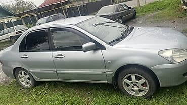 выхлоп бмв е34: Mitsubishi Lancer: 2005 г., Ручные, Бензин, Седан — 6