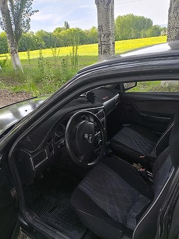 aydi c4: Daewoo Nexia: 2009 г., 1.5 л, Механика, Бензин, Седан — 9