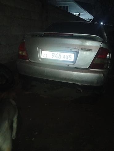 машины мазда: Mazda 323: 2000 г., 0.2 л, Автомат, Бензин, Седан — 4