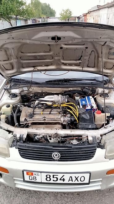 чон арыке: Mazda 323: 1995 г., 1.5 л, Автомат, Бензин — 8