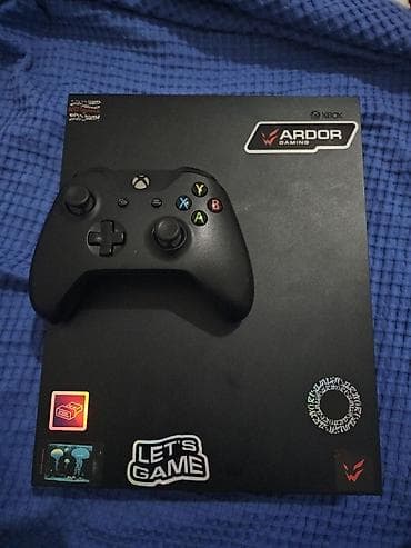 самый дешёвый xbox: Xbox One X, 1 ТБ. Комплект: консоль, 1 оригинальный беспроводной — 1
