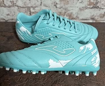 Футбольные бутсы Joma для игры на искусственном покрытии и траве -