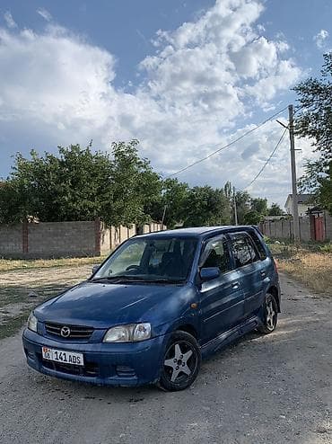 Унаа: Mazda Demio: 2002 г., 1.3 л, Кол менен иштөөчү, Бензин, Хетчбек — 1