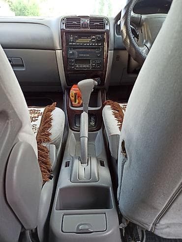 keyless go: Mazda Capella: 2000 г., 1.8 л, Автомат, Бензин, Седан — 4